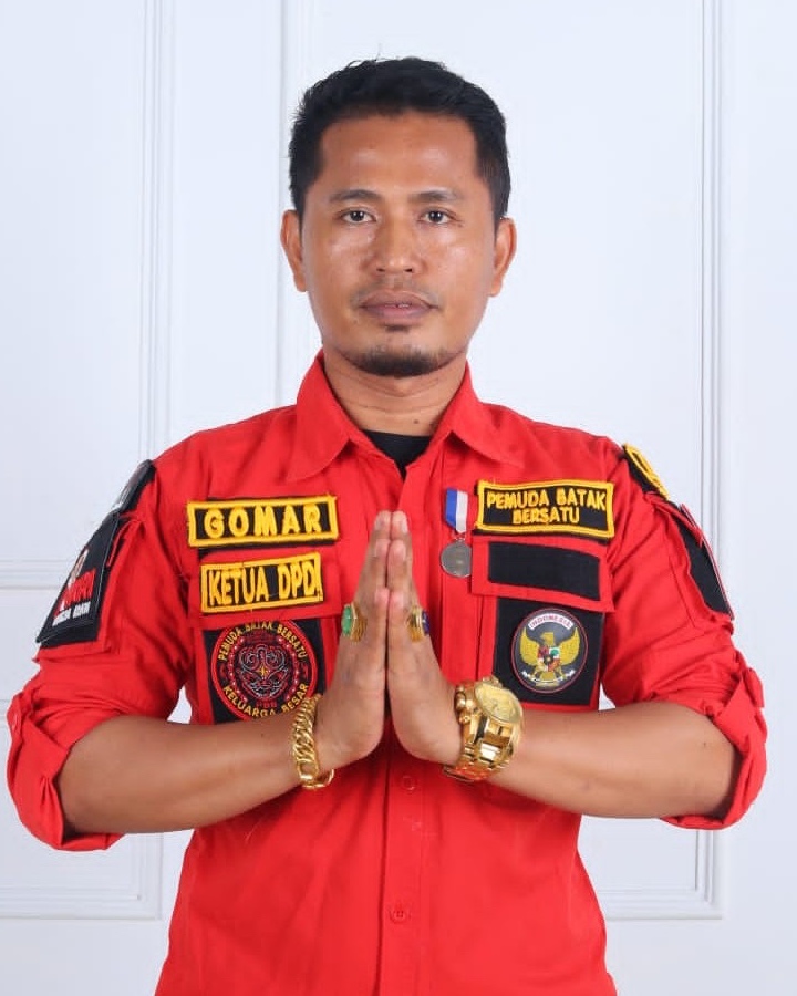 Dr. Ronal Gomar Purba