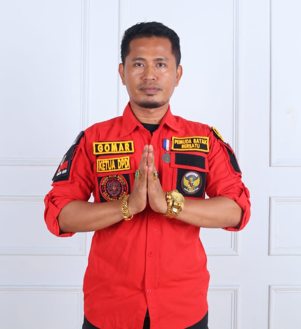Dr. Ronal Gomar Purba